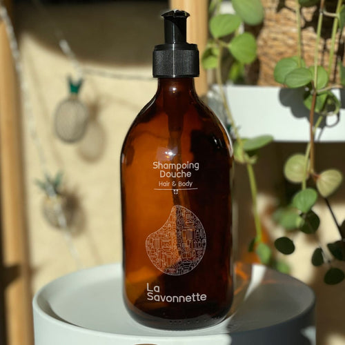 flacon verre shampoing douche produit d'accueil pour hôtel